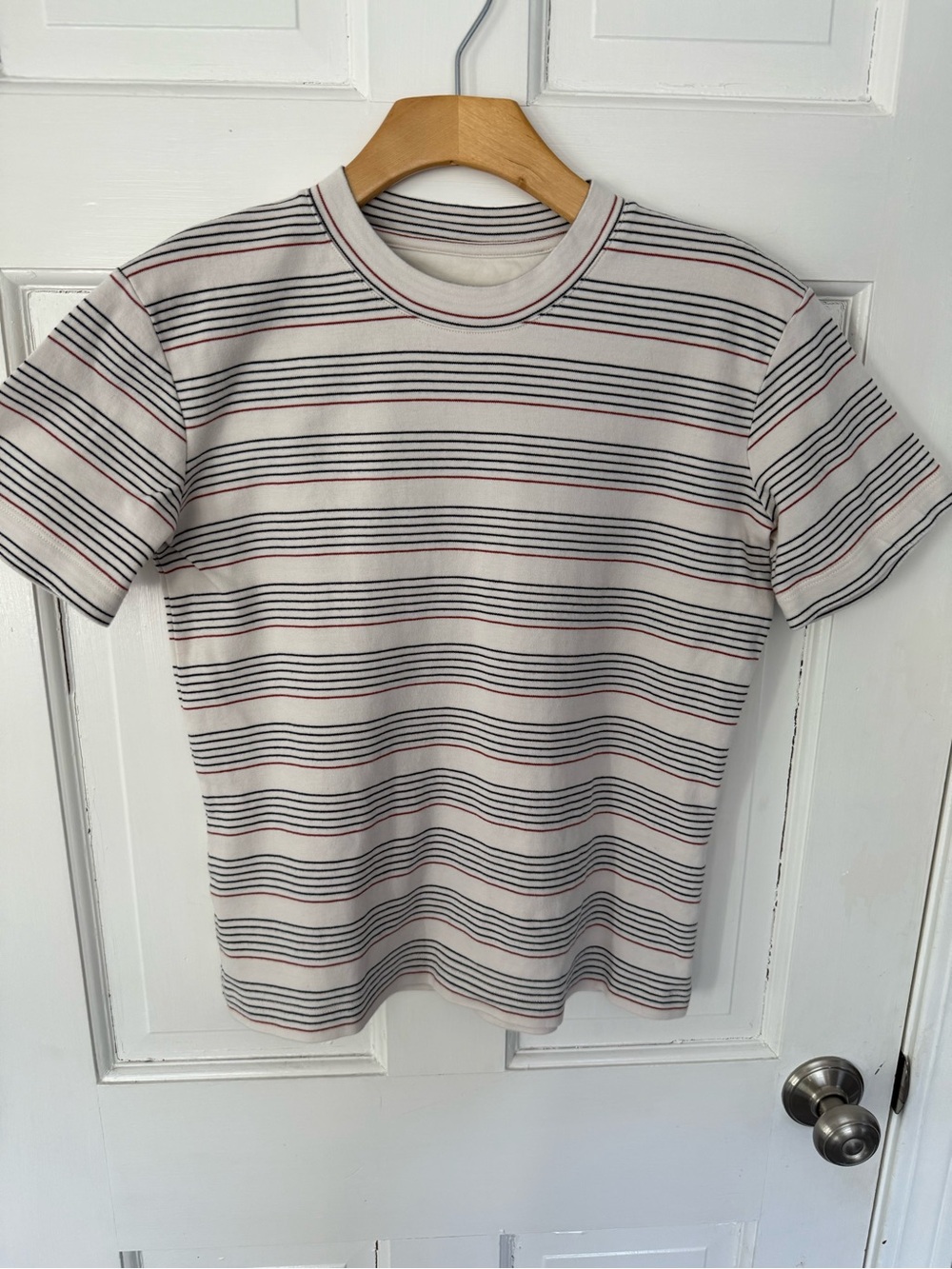 M.M. LaFleur Cream Tee with Black and Red Stripes. 100% Organic cotton. Size S.